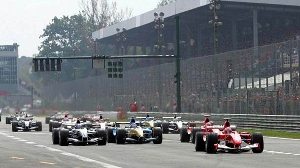 Largada em Monza com Barrichello e Alonso assumindo a liderana - foto: 12.09.2004