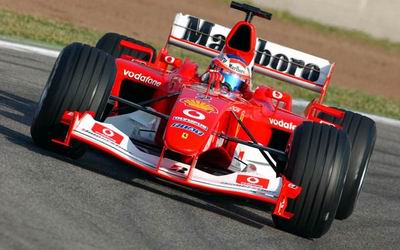 A nova Ferrari F2003GA fez a estria na Espanha garantindo a 1 fila no grid. Na foto, Rubens Barrichello (03.05.2003).