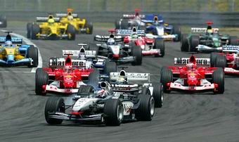 Largada, com Kimi Raikknen  frente seguido de Ralf e Michael Schumacher, Rubens Barrichello, Juan Pablo Montoya e Olivier Panis - foto de 29.06.2003.