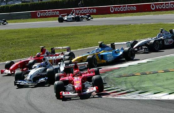 1 curva aps a largada: Schumacher, Montoya, Barrichello, Trulli e Raikknen - foto de 14.09.2003